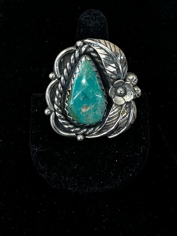 White Brass Kingman Turquoise Tear Drop With Flower Detail Ring Darker Blue